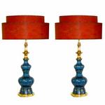Pair vintage Stiffel lamps in blue crackle glaze pottery of double gourd form
** Circa 1960s
** With rounded brass base and brass pagoda motif neck. (Period two tiered fiberglass lampshades sold separately.)
** Height: 34
** $2,500
